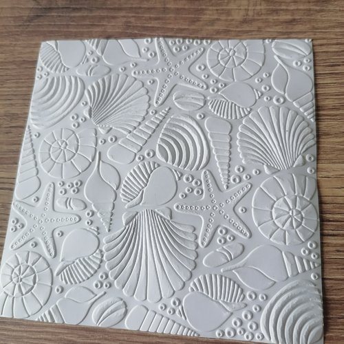 Fond embossé mer plage été coquillages