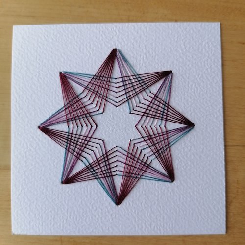 Fond de carte, brodée d'une étoile