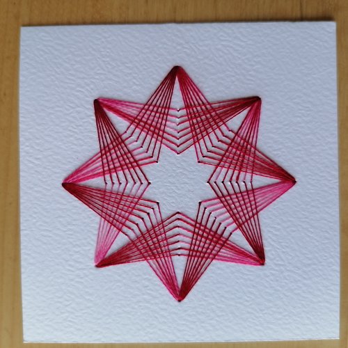 Fond de carte, brodé d'une étoile