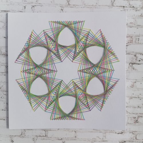 Fond de carte, brodée main d'un mandala multicolore