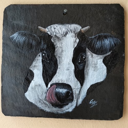 Vache noire et blanche peinture sur ardoise