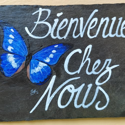 Bienvenue chez nous papillon