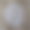 Napperon tricot d'art en coton beige. tricot d'art traditionnel.