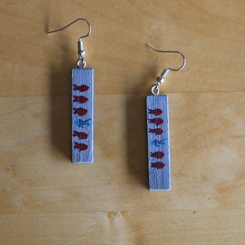 Boucles d'oreilles en bois danser à contre-flot