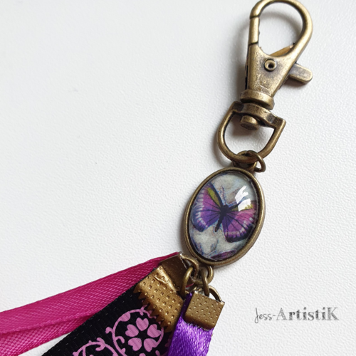 Porte clés femme rubans papillon cabochon violet
