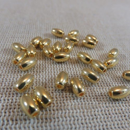 Perles tonneau métal couleur doré 6mm x 4mm - lot de 20