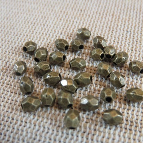 Perles ovale bronze à facette 4x3mm en métal - lot de 25