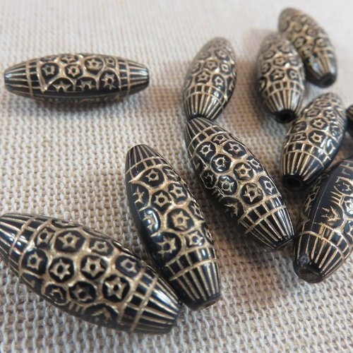 Perles ovale noir et or gravé fleurs de 23x9mm en acrylique - lot de 10