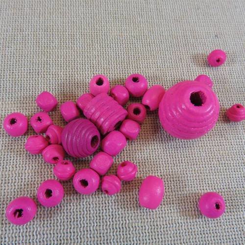 Perles en bois rose foncé diverses forme - lot de 30
