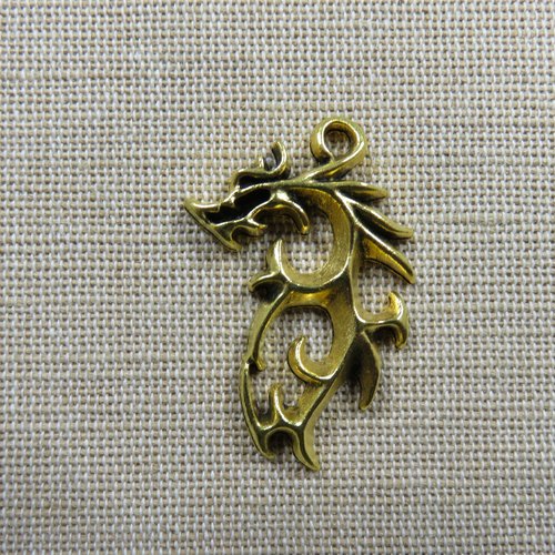 Pendentif dragon tribal métal couleur doré