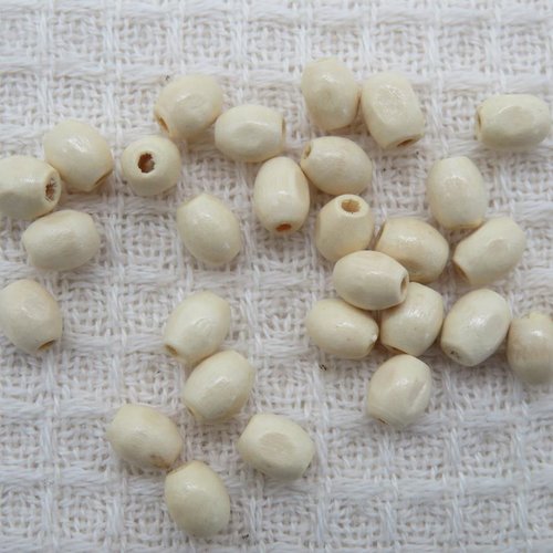 Perles ovale bois beige 6mm x 4mm - lot de 25