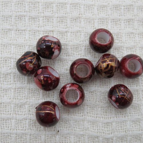 Perles tonneau tréfilé doré 10mm en acrylique - lot de 10