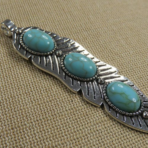 Grand pendentif plume argenté et cabochon bleu turquoise 76mm