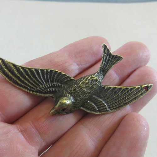 Pendentif oiseau bronze 73mmx35mm en métal