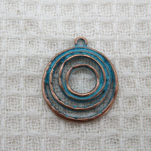 Pendentif rond spiral métal couleur cuivre patiné antique