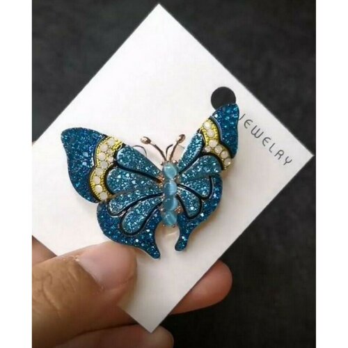 Broche bijou épingle papillon strass cristal bleu azur.