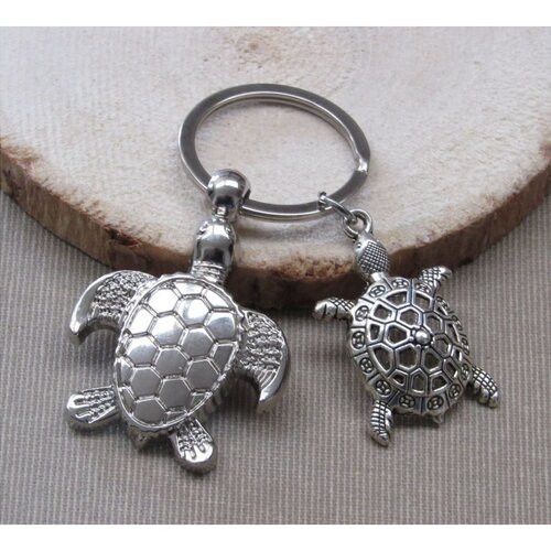 Porte-clés, bijou de sac tortue et son bébé en acier argenté.