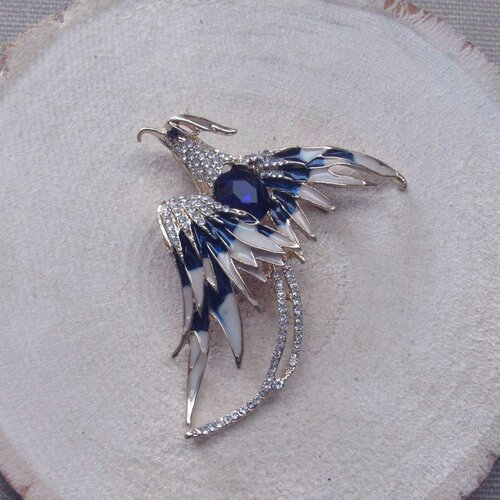 Broche bijou oiseau style phoenix acier doré et bleu.
