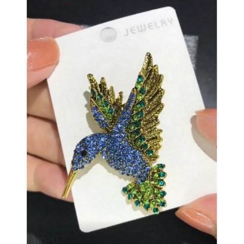 Broche bijou oiseau colibri strass cristal bleu et vert en acier.