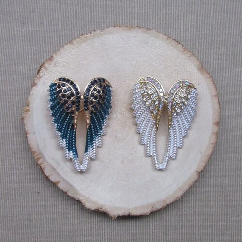 Broche bijou épingle style ailes d'ange en acier.