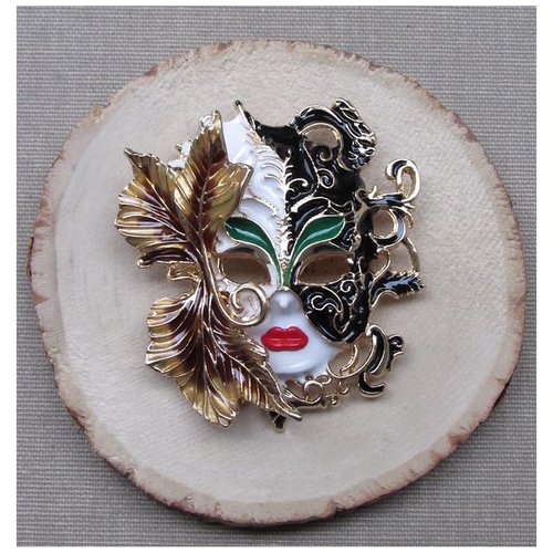 Broche bijou style grand masque de carnaval baroque en acier.