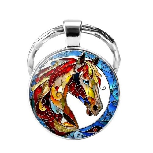 Porte-clés, bijou de sac cabochon tête de cheval multicolore contour bleuté.