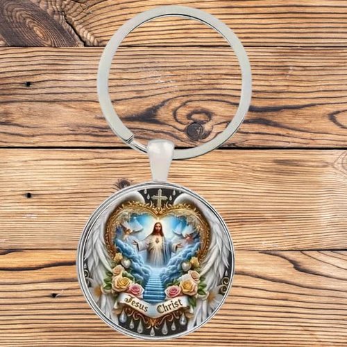 Porte-clés, bijou de sac cabochon jésus christ ailes d'ange sacré coeur.