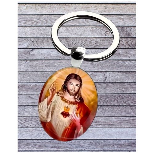 Porte-clés, bijou de sac cabochon ovale jésus christ sacré coeur.