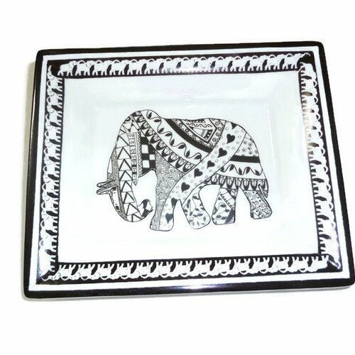 Vide poche porcelaine  éléphant venu d'ailleurs