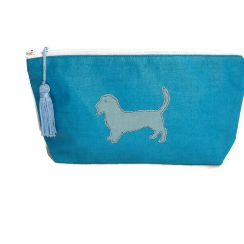 Pochette tissu enduit bleu avec motif chien et pompon
