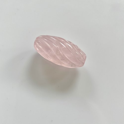 Grosse olive cannelée torsadée en quartz rose