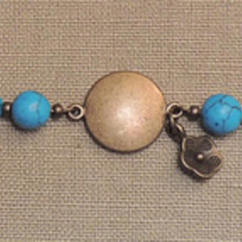 Bracelet connecteur bronze et pierres howlite turquoise 
