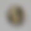 Un cabochon verre rond la fée clochette diam 17