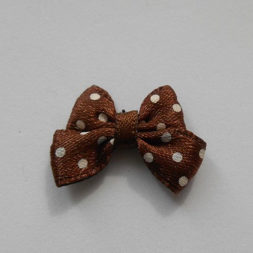 Noeud tissu marron à pois blanc