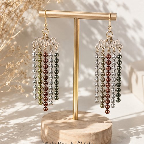 Boucles d'oreilles pendantes en perles métallisées . composants recyclés