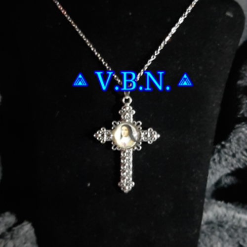 Collier croix avec ste thérèse de l'enfant jésus métal argenté