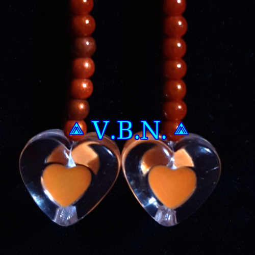Boucles d'oreilles coeur acrylique transparent orange