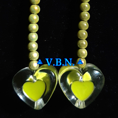 Boucles d'oreilles coeur acrylique transparent jaune