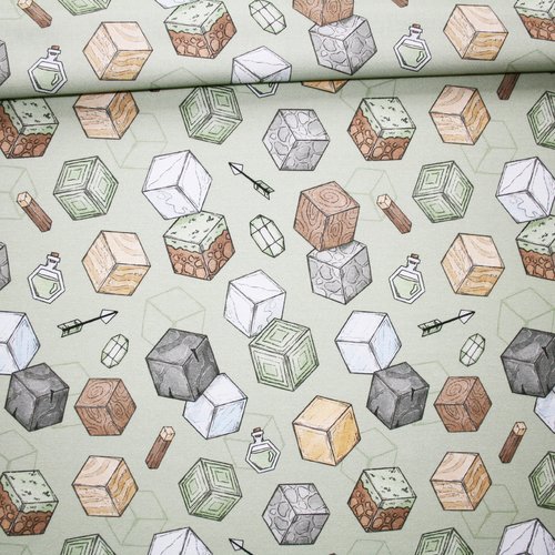 Tissu blocs sur un fond vert pastel en coton imprimé premium oeko-tex