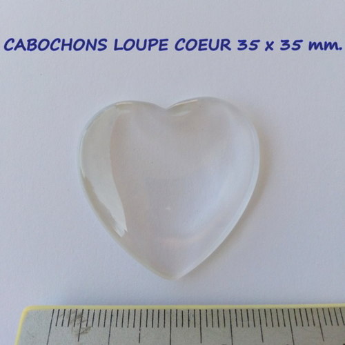 Cabochon loupe coeur pour confection de pendentifs ou autres.