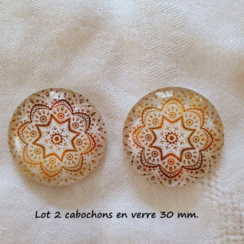 Lot de 2 cabochons ronds de 30 mm de diamètre.