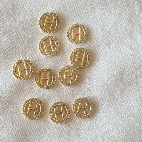 Bijoux d'ongles charms logos marque de luxe en métal doré et strass (484.8176)