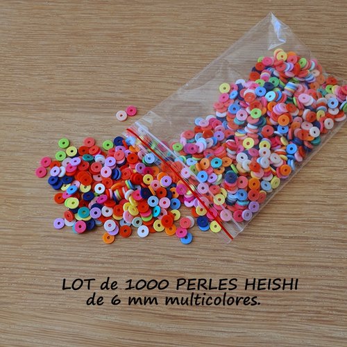 Lot de 1000 perles heishi multicolores en pate polymere.