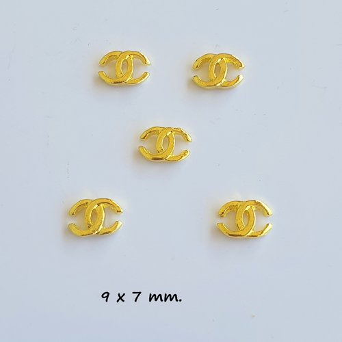Bijoux d'ongles charms pour nail art en métal doré.(503.8146)