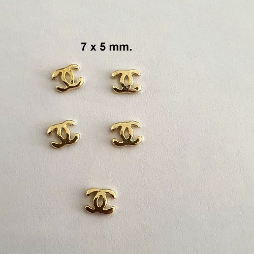 Bijoux d'ongles charms pour nail art en métal doré.7 x 5 mm.(512.8246)