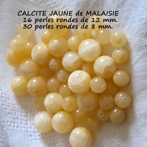 Lot de 46 perles rondes en calcite jaune de malaisie.