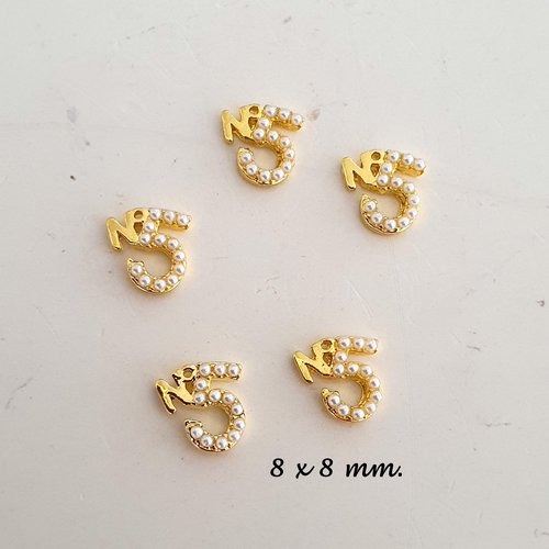 Bijoux d'ongles charms pour nail art en métal doré.(518.7292)