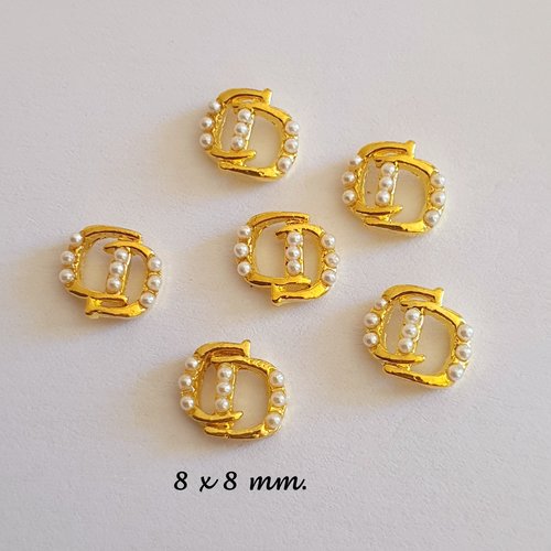 Bijoux d'ongles charms pour nail art en métal doré.(518.7302)