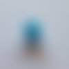 10 pompons fourrure 15mm bleue ciel