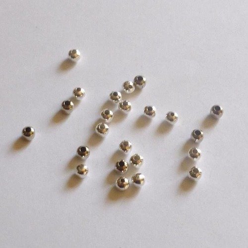 20 perles rondes en métal argenté clair  4mm